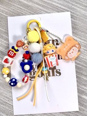 Brown Pebbled Leather Tote with Colorful Charm Keychain